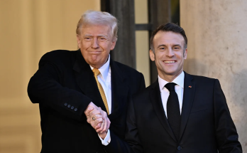 Social media reacts to Trump 'dominating world leaders' with Macron handshake during meeting in France