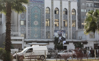 Gunmen storm Iranian embassy in Damascus as Russia claims Assad left 'instructions' to 'transfer power'