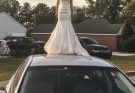 I Stepped Outside One Morning and Saw a Woman in a Wedding Dress on My Husband's Car Roof