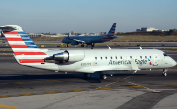 Airplane wing strikes tug vehicle at Chicago airport, leaving driver hospitalized