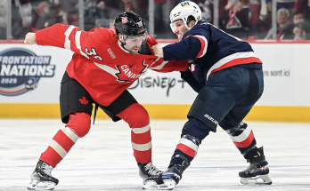 American hockey star Zach Werenski reacts to national anthem boos