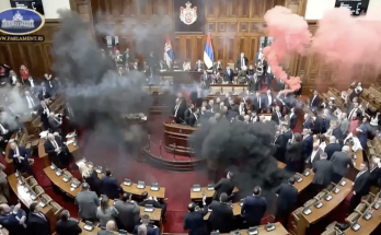 Serbian lawmakers throw smoke grenades, tear gas in parliament