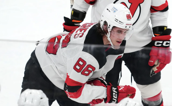 Devils star Jack Hughes out for season following hard crash into boards