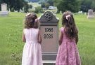 Girls Visit Dad's Grave to 'Show' Their New Dresses as He Asked, See 2 Boxes with Their Names – Story of the Day