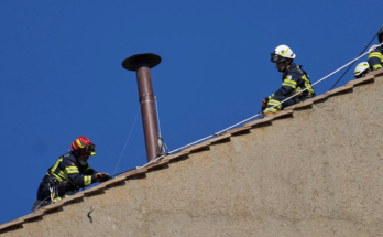 Chimney installed on Sistine Chapel's roof ahead of conclave to pick Pope Francis' successor