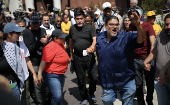 SEIU leader charged with 'conspiracy to impede an officer' for protesting ICE raid